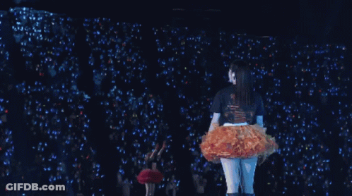 A Girl Wearing A Black Shirt That Says ' I Love You ' GIF