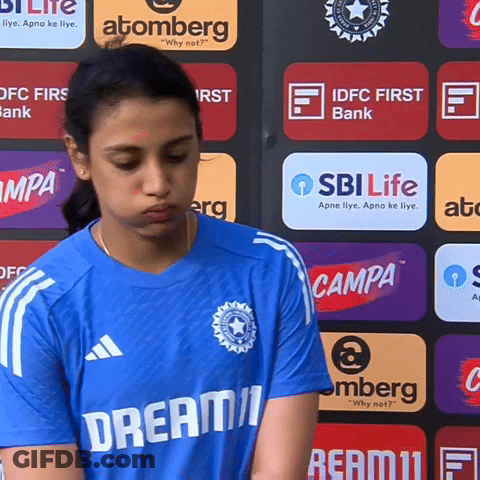 A Girl Wearing A Blue Shirt That Says Dream11 GIF