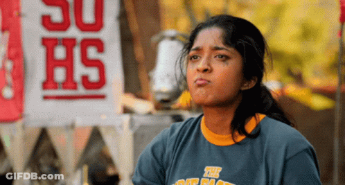 A Girl Wearing A Blue Shirt With The Word Hs On The Front GIF