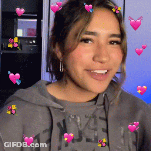 A Girl Wearing A Grey Hoodie With The Number 43 On The Front GIF
