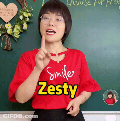 A Girl Wearing A Red Shirt That Says Smile Zesty GIF