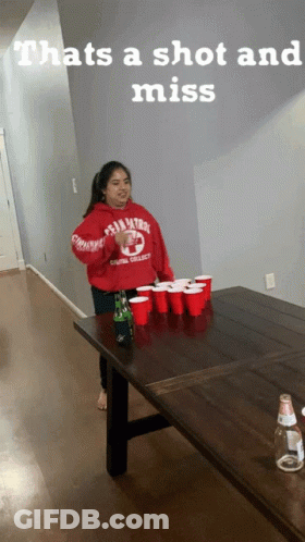 A Girl Wearing A Red Sweatshirt That Says Penn State On It GIF