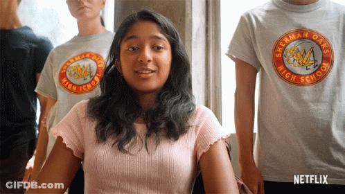 A Girl Wearing A Sherman Oaks High School Shirt GIF