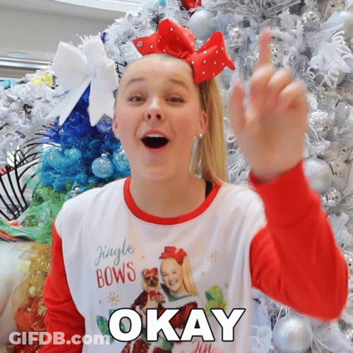 A Girl Wearing A Shirt That Says Jingle Bows Is Giving The Middle Finger GIF