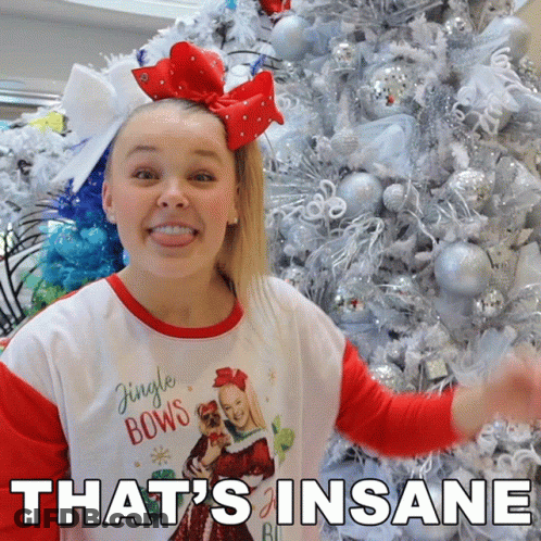 A Girl Wearing A Shirt That Says Jingle Bows On It GIF