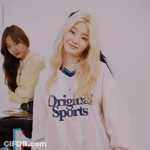 A Girl Wearing A Shirt That Says Original Sports On It GIF