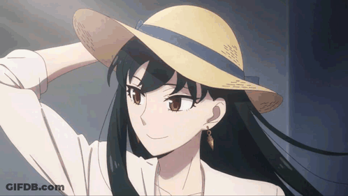 A Girl Wearing A Straw Hat And Earrings Is Smiling GIF
