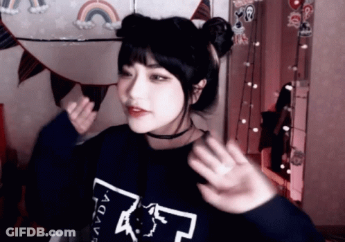 A Girl Wearing A Sweatshirt That Says Avdv GIF