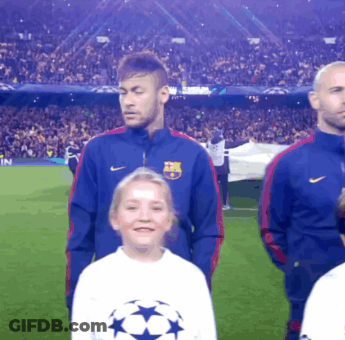 A Girl Wearing A White Shirt With A Soccer Star On It GIF