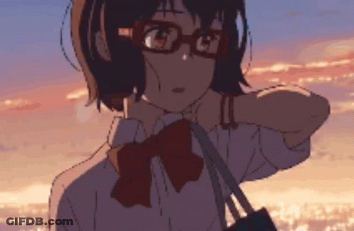A Girl Wearing Glasses And A Bow Tie Looks At The Sunset GIF