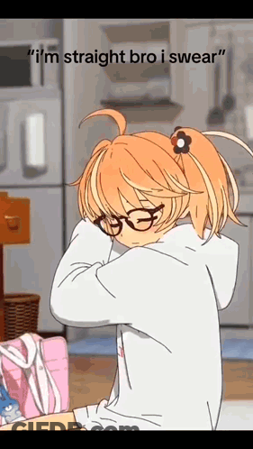 A Girl Wearing Glasses And A Flower In Her Hair Is Standing In A Kitchen . GIF