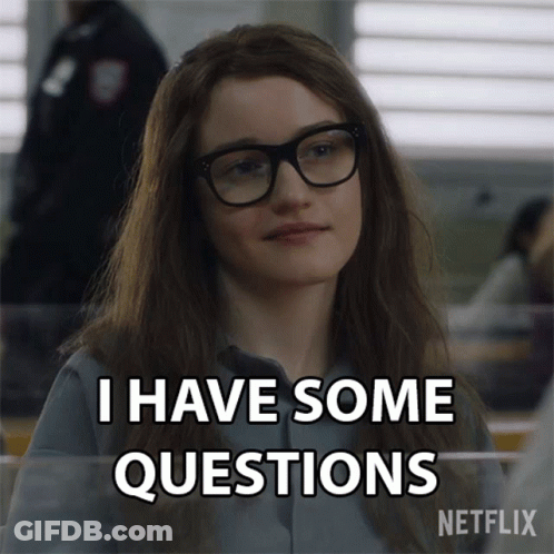 A Girl Wearing Glasses Says I Have Some Questions GIF