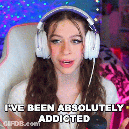 A Girl Wearing Headphones Says I 'Ve Been Absolutely Addicted . GIF