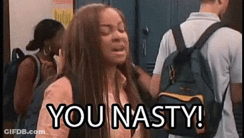 A Girl With A Backpack Is Standing In A Locker Room With A Man Standing Behind Her . GIF