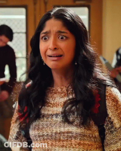 A Girl With A Backpack Making A Funny Face GIF