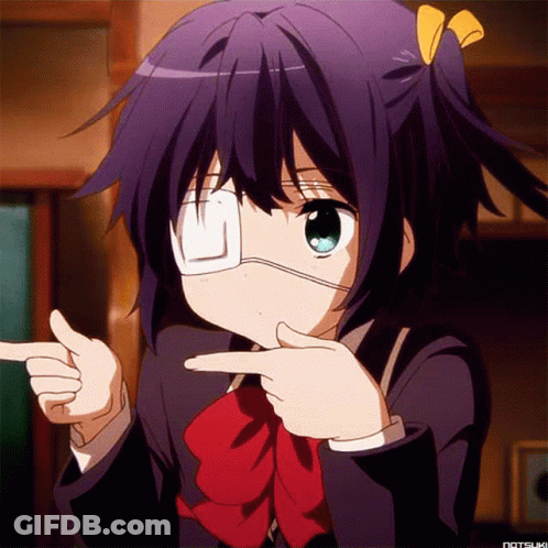 A Girl With A Bandage On Her Eye Is Pointing GIF