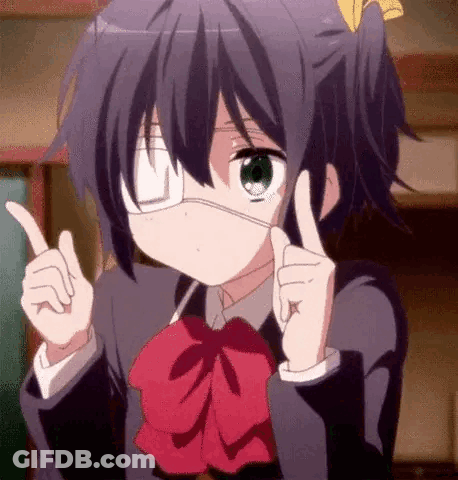 A Girl With A Bandage On Her Eye Is Pointing Up With Her Fingers . GIF