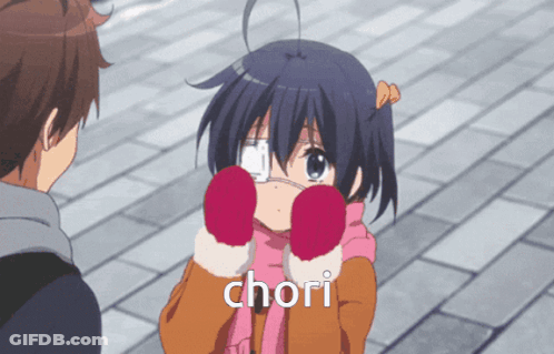 A Girl With A Bandage On Her Eye Is Wearing Red Gloves And The Word Chori Is On The Bottom Right GIF