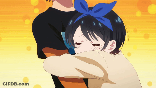 A Girl With A Blue Bow In Her Hair Is Being Hugged By A Man GIF