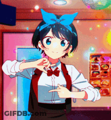 A Girl With A Blue Bow On Her Head Is Pointing Her Finger GIF