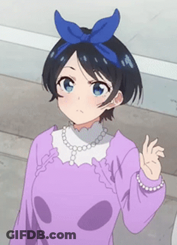 A Girl With A Blue Bow On Her Head Is Wearing A Purple Shirt And Pearls GIF