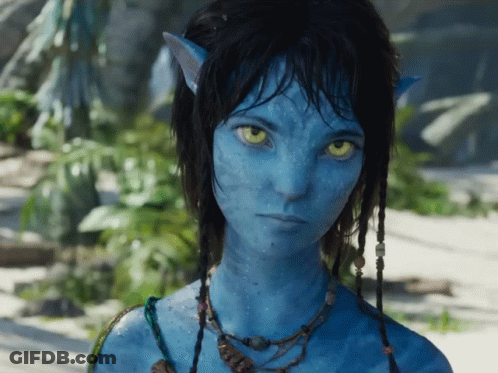 A Girl With A Blue Face And Yellow Eyes GIF