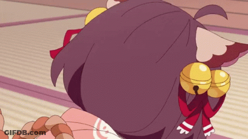 A Girl With A Cat Ear And Bells On Her Ears GIF