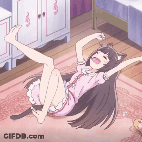 A Girl With A Cat Ear Is Laying On The Floor With Her Arms Outstretched GIF