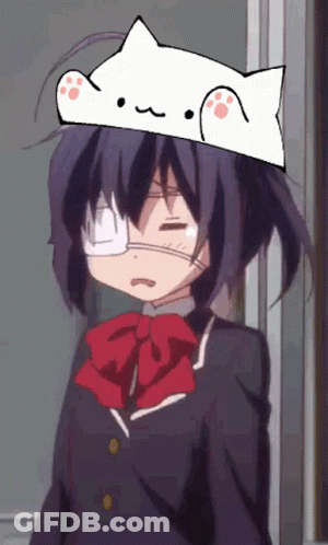A Girl With A Cat Hat On Her Head Making A Face GIF