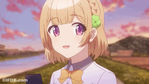 A Girl With A Flower In Her Hair Is Holding A Cellphone GIF