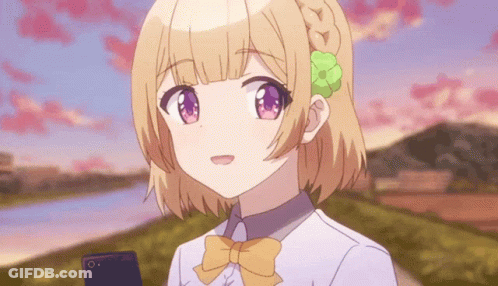 A Girl With A Flower In Her Hair Is Holding A Phone GIF