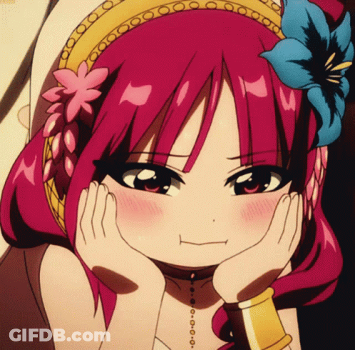 A Girl With A Flower In Her Hair Is Making A Funny Face GIF