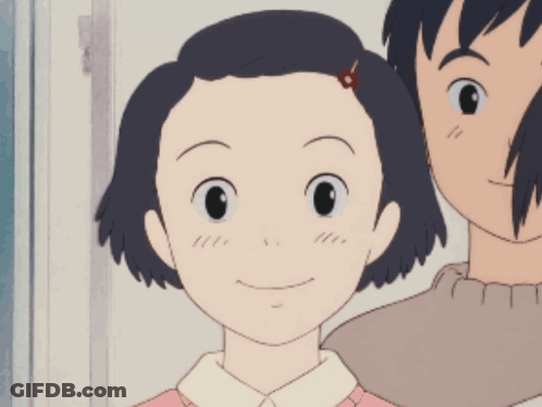 A Girl With A Flower In Her Hair Is Smiling In A Cartoon GIF