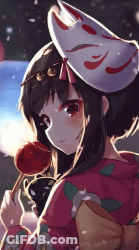 A Girl With A Mask On Her Head Is Holding A Red Candy GIF