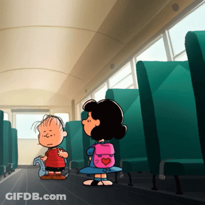 A Girl With A Pink Backpack With A Heart On It Stands Next To A Boy On A Bus GIF