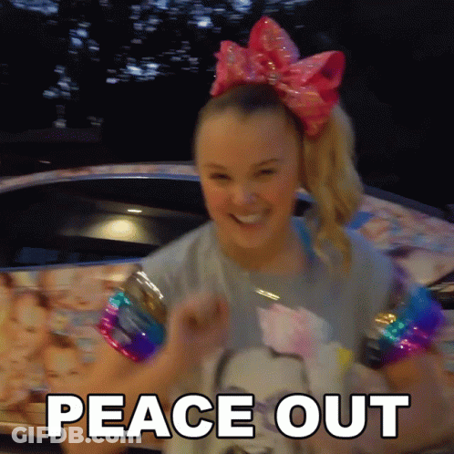 A Girl With A Pink Bow In Her Hair Is Standing In Front Of A Car And Says Peace Out GIF