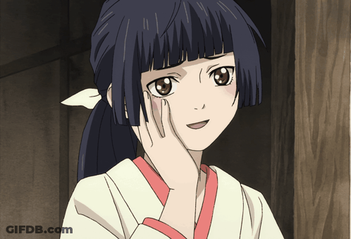 A Girl With A Ponytail Has Her Hand On Her Cheek GIF