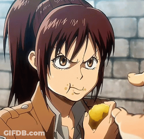 A Girl With A Ponytail Is Eating A Piece Of Food From A Person 'S Hand GIF