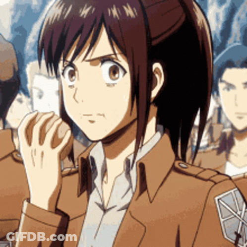 A Girl With A Ponytail Is Wearing A Brown Jacket And A White Shirt GIF