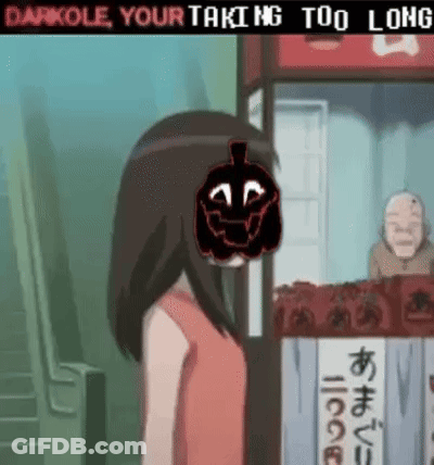 A Girl With A Pumpkin On Her Head Is Standing In Front Of A Kiosk . GIF