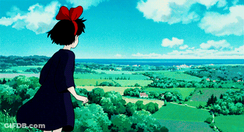 A Girl With A Red Bow In Her Hair Looks Out Over A Lush Green Landscape GIF