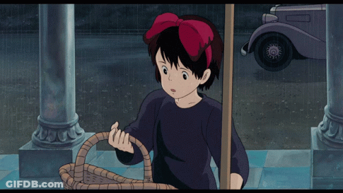 A Girl With A Red Bow On Her Head Is Holding A Basket In The Rain GIF
