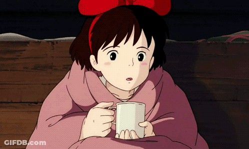 Girl With Red Bow Holding Mug GIF