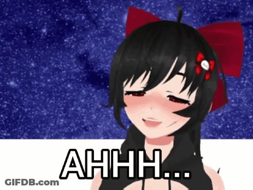 A Girl With A Red Bow On Her Head Is Smiling And Says Ahhh GIF
