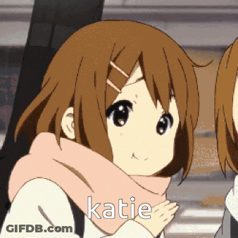 A Girl With A Scarf Around Her Neck Has Katie Written On Her Face GIF