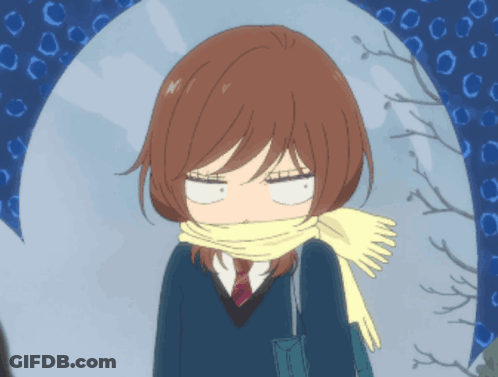 A Girl With A Scarf Around Her Neck Is Making An Angry Face GIF