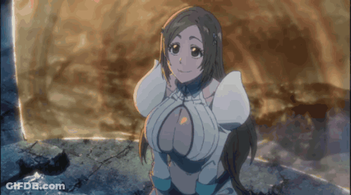 A Girl With A Very Large Breast Is Smiling GIF