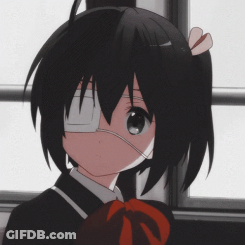 A Girl With Black Hair And A Bandage On Her Eye GIF