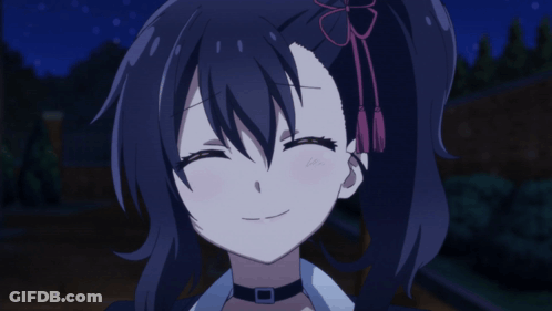 A Girl With Black Hair And A Choker On Her Neck Is Smiling GIF