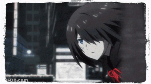 A Girl With Black Hair And Blue Eyes Is Looking Down GIF